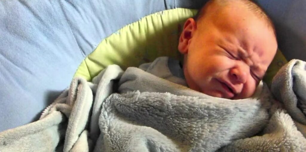 why do babies cry in their sleep